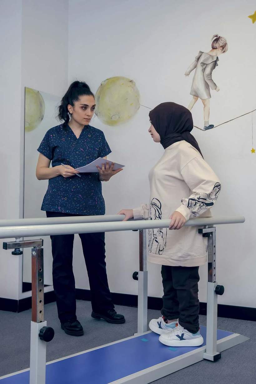 Guided rehabilitation on parallel bars after surgery